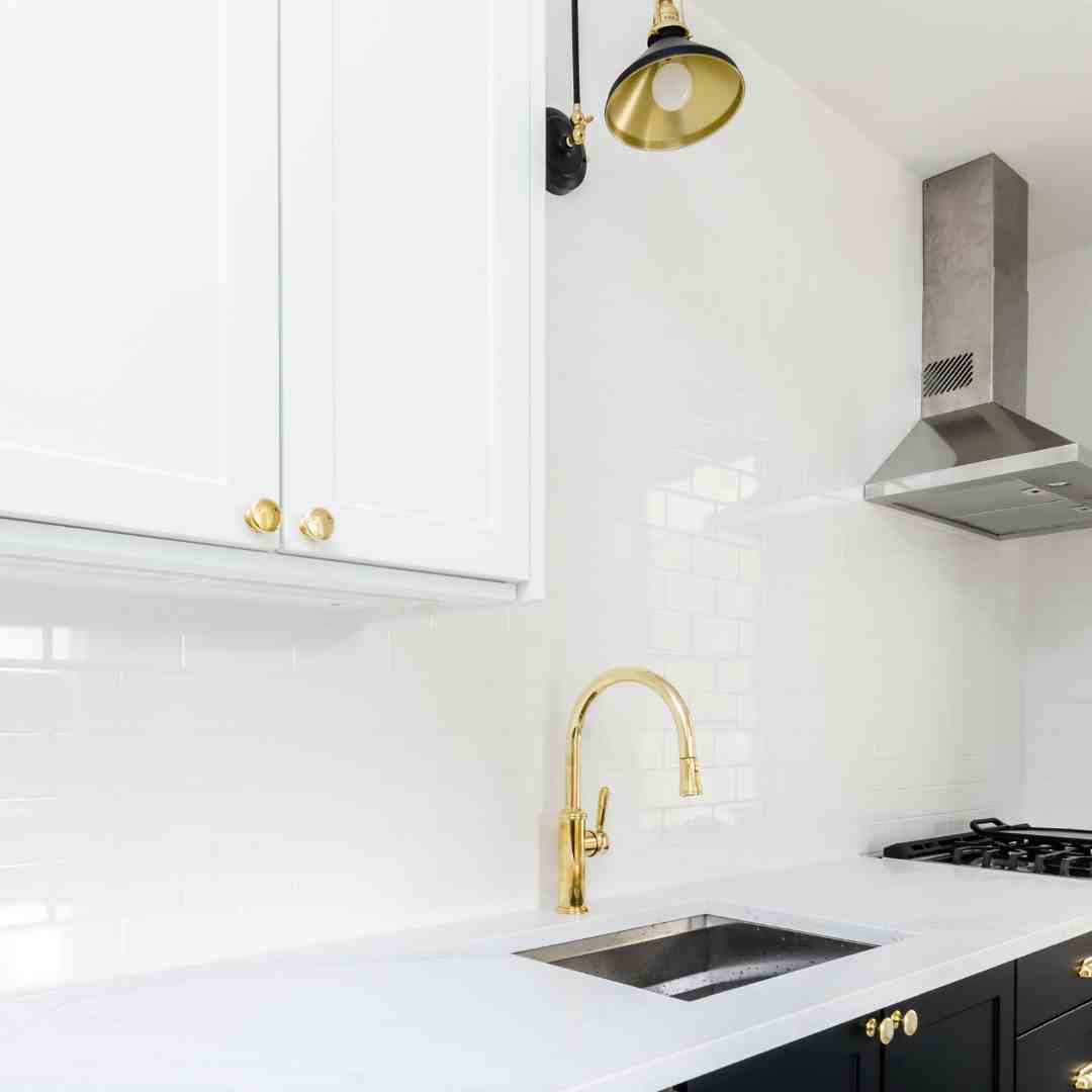 Distance of pendant lights over kitchen sink from wall